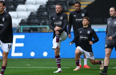 120926 Swansea City v Burnley, EFL Sky Bet Championship - Jamie Vardy of Burnley warms up as he is announced on the replacements bench for the match