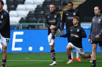 120926 Swansea City v Burnley, EFL Sky Bet Championship - Jamie Vardy of Burnley warms up as he is announced on the replacements bench for the match