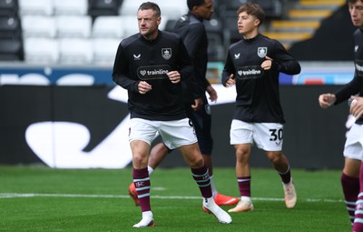 120926 Swansea City v Burnley, EFL Sky Bet Championship - Jamie Vardy of Burnley warms up as he is announced on the replacements bench for the match