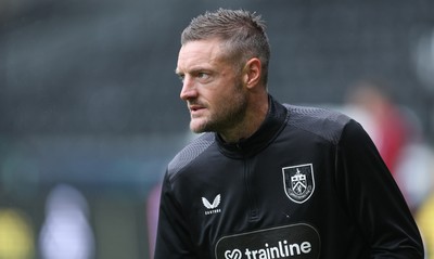 120926 Swansea City v Burnley, EFL Sky Bet Championship - Jamie Vardy of Burnley warms up as he is announced on the replacements bench for the match
