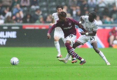 120926 Swansea City v Burnley, EFL Sky Bet Championship - Largie Ramazani of Burnley and Moussa Yeo of Swansea City compete for the ball