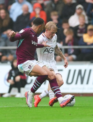 120926 Swansea City v Burnley, EFL Sky Bet Championship - Melker Widell of Swansea City takes on Aaron Ramsey of Burnley
