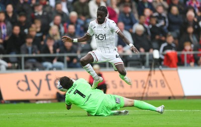 120926 Swansea City v Burnley, EFL Sky Bet Championship - Moussa Yeo of Swansea City is denied a shot at goal by Burnley goalkeeper Max Weiss