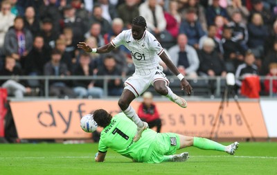 120926 Swansea City v Burnley, EFL Sky Bet Championship - Moussa Yeo of Swansea City is denied a shot at goal by Burnley goalkeeper Max Weiss