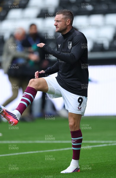 120926 Swansea City v Burnley, EFL Sky Bet Championship - Jamie Vardy of Burnley warms up as he is announced on the replacements bench for the match