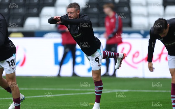 120926 Swansea City v Burnley, EFL Sky Bet Championship - Jamie Vardy of Burnley warms up as he is announced on the replacements bench for the match