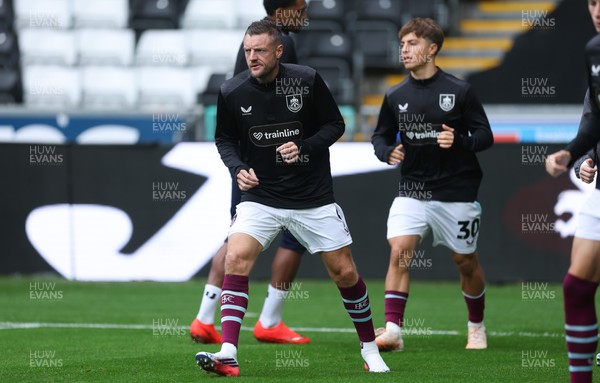 120926 Swansea City v Burnley, EFL Sky Bet Championship - Jamie Vardy of Burnley warms up as he is announced on the replacements bench for the match