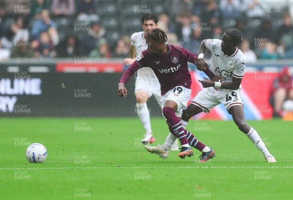 120926 Swansea City v Burnley, EFL Sky Bet Championship - Largie Ramazani of Burnley and Moussa Yeo of Swansea City compete for the ball