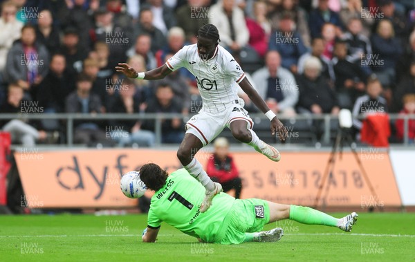 120926 Swansea City v Burnley, EFL Sky Bet Championship - Moussa Yeo of Swansea City is denied a shot at goal by Burnley goalkeeper Max Weiss