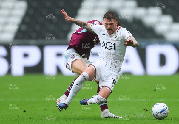 120926 Swansea City v Burnley, EFL Sky Bet Championship - Josh Tymon of Swansea City is brought down by Oliver Sonne of Burnley