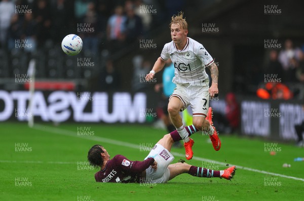 120926 Swansea City v Burnley, EFL Sky Bet Championship -  Melker Widell of Swansea City gets past Connor Roberts of Burnley