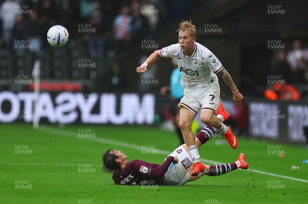 120926 Swansea City v Burnley, EFL Sky Bet Championship -  Melker Widell of Swansea City gets past Connor Roberts of Burnley