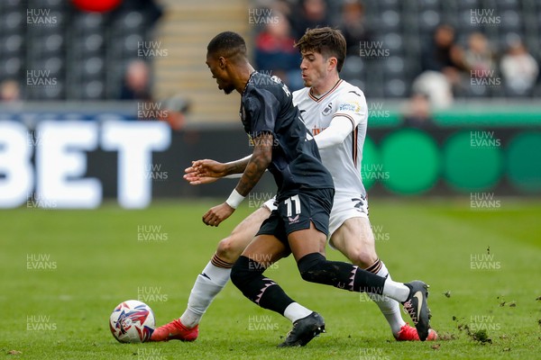 150325 - Swansea City v Burnley - Sky Bet Championship - Josh Key of Swansea City battles for the ball with Jaidon Anthony of Burnley