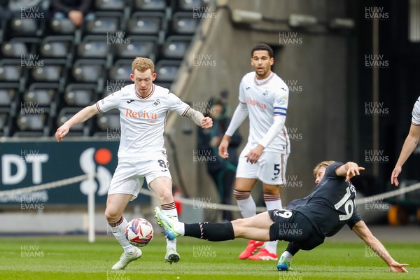 150325 - Swansea City v Burnley - Sky Bet Championship - Lewis O'Brien of Swansea City is tackled by Zian Flemming of Burnley