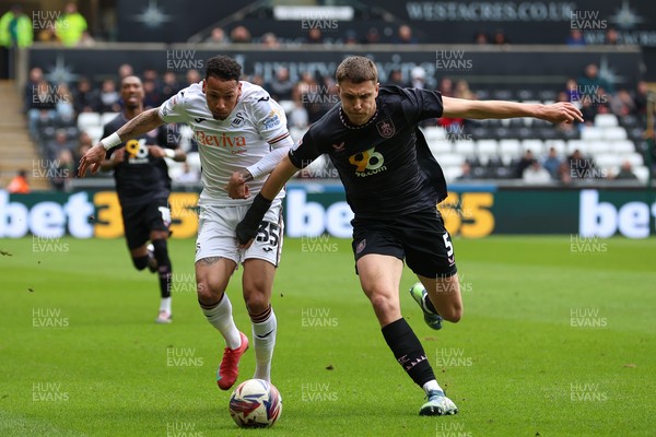 150325 - Swansea City v Burnley - Sky Bet Championship - Ronald of Swansea City battles for the ball with Maxime Estève of Burnley