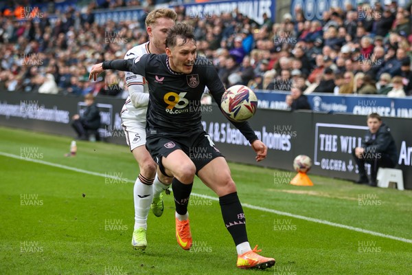 150325 - Swansea City v Burnley - Sky Bet Championship - Connor Roberts of Burnley is tackled by Ollie Cooper of Swansea City