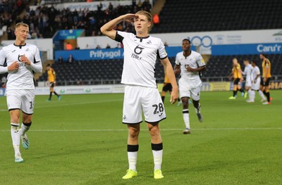 280819 - Swansea City v Cambridge United, Carabao Cup, Round 2 - George Byers of Swansea City salutes the fans after scoring the second goal