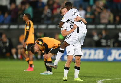 280819 - Swansea City v Cambridge United, Carabao Cup, Round 2 - Jordon Garrick of Swansea City celebrates with George Byers of Swansea City after scoring the fourth goal