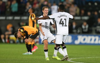 280819 - Swansea City v Cambridge United, Carabao Cup, Round 2 - Jordon Garrick of Swansea City celebrates with George Byers of Swansea City after scoring the fourth goal