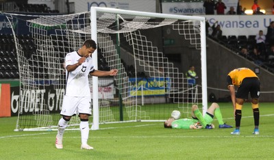 280819 - Swansea City v Cambridge United, Carabao Cup, Round 2 - Wayne Routledge of Swansea City puts the ball past Cambridge United goalkeeper Callum Burton to score Swansea's sixth goal