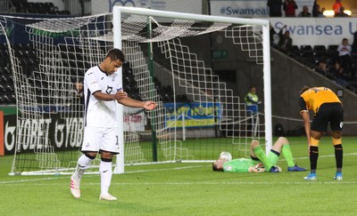 280819 - Swansea City v Cambridge United, Carabao Cup, Round 2 - Wayne Routledge of Swansea City puts the ball past Cambridge United goalkeeper Callum Burton to score Swansea's sixth goal