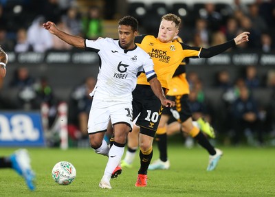 280819 - Swansea City v Cambridge United, Carabao Cup, Round 2 - Wayne Routledge of Swansea City takes on George Maris of Cambridge United