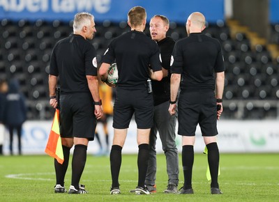 280819 - Swansea City v Cambridge United, Carabao Cup, Round 2 - Swansea City head coach Steve Cooper speaks to the match officials at the end of the match