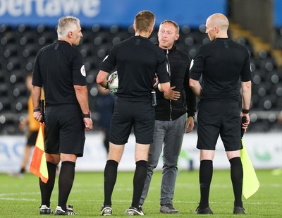 280819 - Swansea City v Cambridge United, Carabao Cup, Round 2 - Swansea City head coach Steve Cooper speaks to the match officials at the end of the match