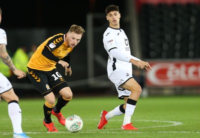 280819 - Swansea City v Cambridge United, Carabao Cup, Round 2 - Jack Evans of Swansea City looks to win the ball