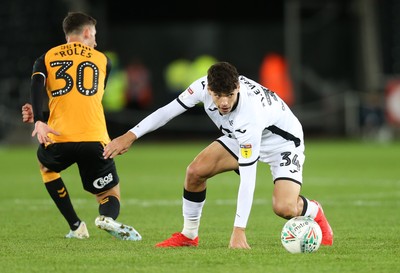 280819 - Swansea City v Cambridge United, Carabao Cup, Round 2 - Jack Evans of Swansea City looks to win the ball