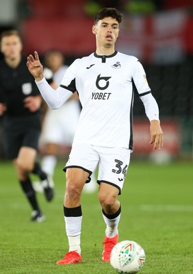 280819 - Swansea City v Cambridge United, Carabao Cup, Round 2 - Jack Evans of Swansea City looks to win the ball