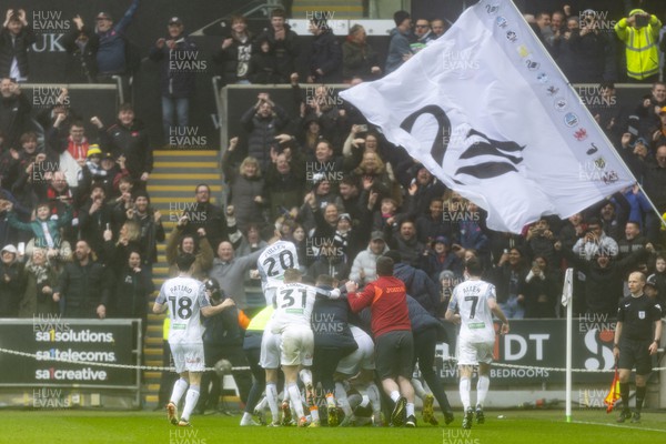 160324 - Swansea City v Cardiff City - Sky Bet Championship - Swansea City celebrate their side second goal scored by Jamal Lowe