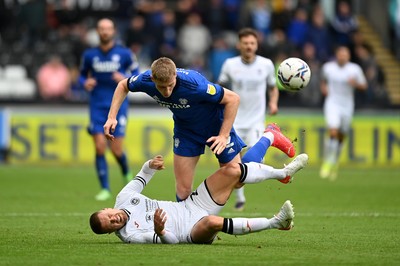 171021 - Swansea City v Cardiff City - Sky Bet Championship - Jake Bidwell of Swansea City battles with Mark McGuinness of Cardiff City 