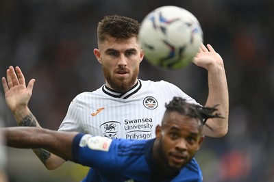 171021 - Swansea City v Cardiff City - Sky Bet Championship - Ryan Manning of Swansea City battles with Leandro Bacuna of Cardiff City 