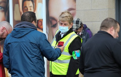 171021 - Swansea City v Cardiff City, EFL Sky Bet Championship - Checks are made on fans COVID Passes as they arrive at the ground, as it becomes a necessity for attendance at sporting events in Wales