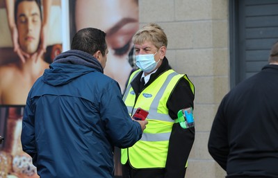 171021 - Swansea City v Cardiff City, EFL Sky Bet Championship - Checks are made on fans COVID Passes as they arrive at the ground, as it becomes a necessity for attendance at sporting events in Wales