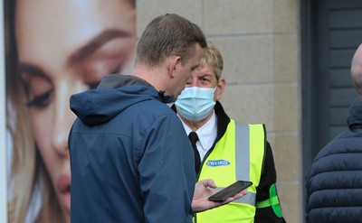 171021 - Swansea City v Cardiff City, EFL Sky Bet Championship - Checks are made on fans COVID Passes as they arrive at the ground, as it becomes a necessity for attendance at sporting events in Wales