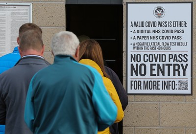 171021 - Swansea City v Cardiff City, EFL Sky Bet Championship - Checks are made on fans COVID Passes as they arrive at the ground, as it becomes a necessity for attendance at sporting events in Wales