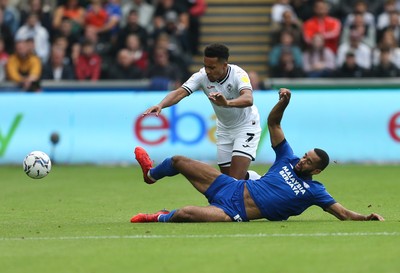 171021 - Swansea City v Cardiff City, EFL Sky Bet Championship - Korey Smith of Swansea City is tackled by Curtis Nelson of Cardiff City