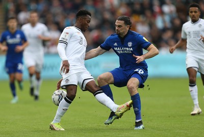 171021 - Swansea City v Cardiff City, EFL Sky Bet Championship - Ethan Laird of Swansea City is tackled by Ciaron Brown of Cardiff City