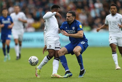 171021 - Swansea City v Cardiff City, EFL Sky Bet Championship - Ethan Laird of Swansea City is tackled by Ciaron Brown of Cardiff City