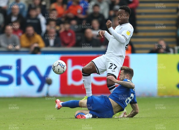 171021 - Swansea City v Cardiff City, EFL Sky Bet Championship - Ethan Laird of Swansea City is tackled by Joe Ralls of Cardiff City