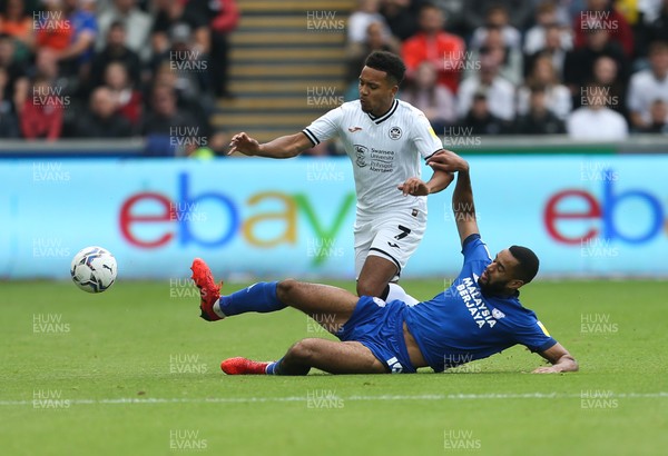 171021 - Swansea City v Cardiff City, EFL Sky Bet Championship - Korey Smith of Swansea City is tackled by Curtis Nelson of Cardiff City