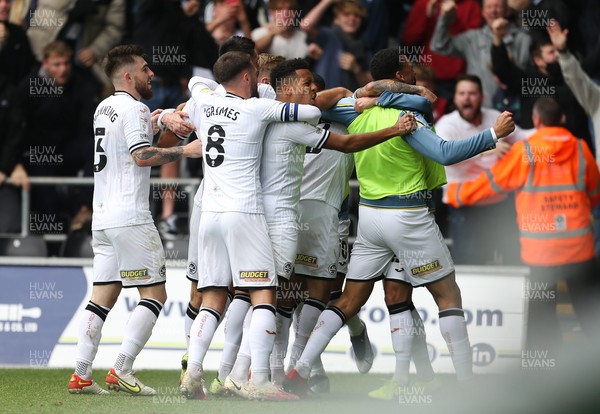 171021 - Swansea City v Cardiff City, EFL Sky Bet Championship - Swansea City players celebrate with Jamie Paterson of Swansea City after he scores the opening goal
