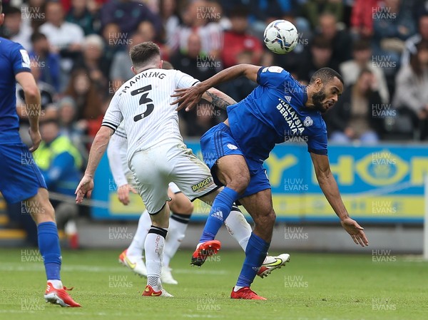 171021 - Swansea City v Cardiff City, EFL Sky Bet Championship - Ryan Manning of Swansea City and Curtis Nelson of Cardiff City compete for the ball