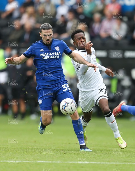 171021 - Swansea City v Cardiff City, EFL Sky Bet Championship - Ciaron Brown of Cardiff City holds off Ethan Laird of Swansea City