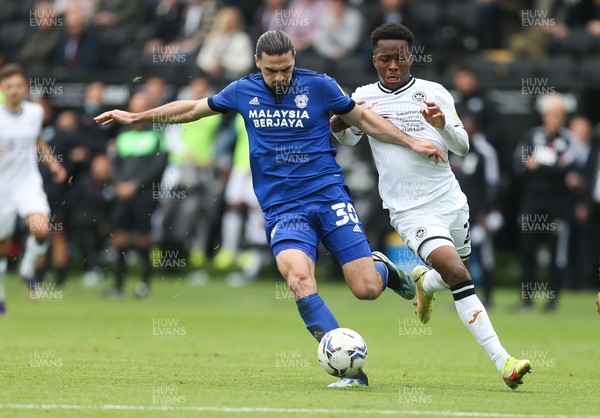 171021 - Swansea City v Cardiff City, EFL Sky Bet Championship - Ciaron Brown of Cardiff City holds off Ethan Laird of Swansea City