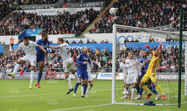 171021 - Swansea City v Cardiff City, EFL Sky Bet Championship - Curtis Nelson of Cardiff City heads over the Swansea goal