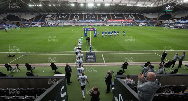 200321 Swansea City v Cardiff City, Sky Bet Championship - The Swansea City team walk out at the Liberty Stadium for the start of the match