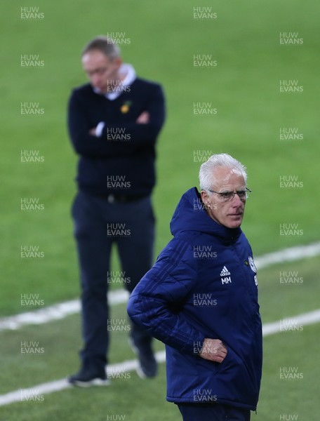 200321 Swansea City v Cardiff City, Sky Bet Championship - Cardiff City manager Mick McCarthy foreground with Swansea City head coach Steve Cooper in the background during the match